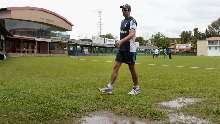 England captain Alastair Cook sidesteps the puddles at Colombo's P Sara Oval
