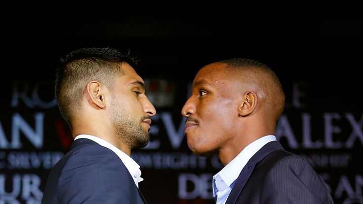 Amir Khan and Devon Alexander face off onstage during their fight announcement at The Conga Room on November 4, 2014 in Los Angeles