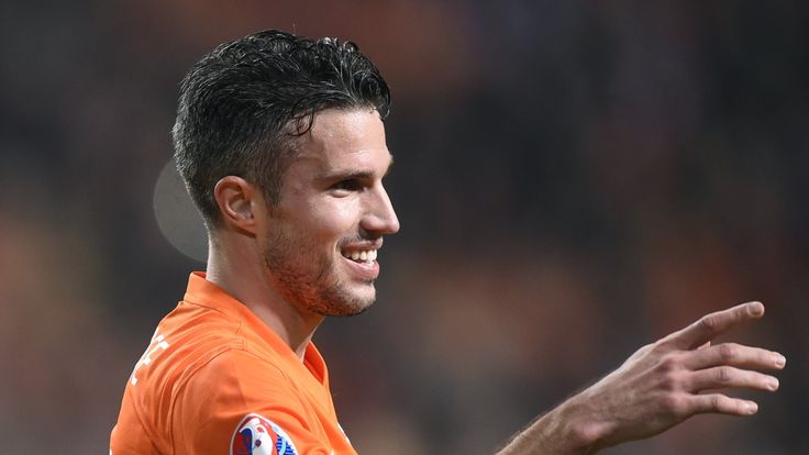 Dutch player Robin Van Persie celebrates after scoring during the Euro 2016 qualifying round football match between the Netherlands and Latvia
