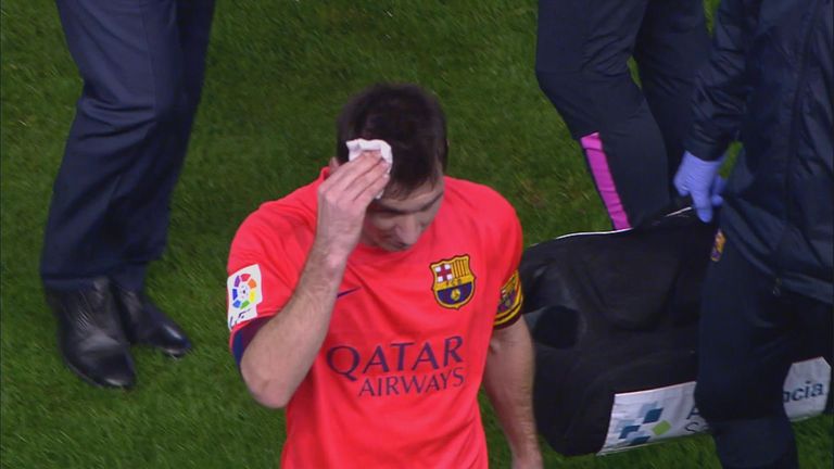 Messi struck by bottle