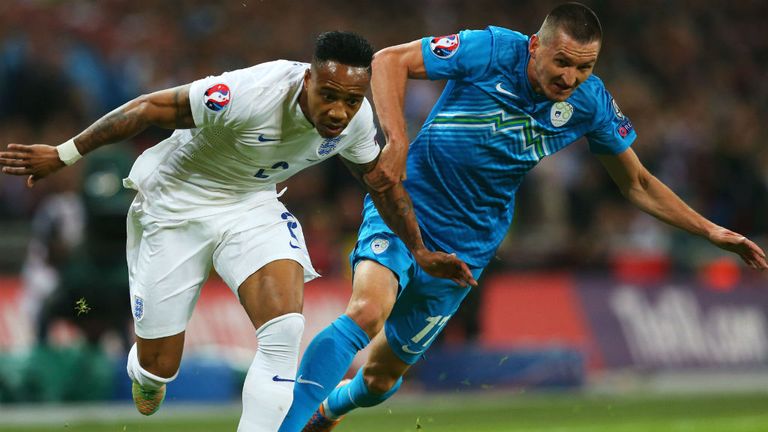 Nathaniel Clyne of England battles with Andraz Kirm of Slovenia during the EURO 2016 Qualifier Group E match at Wembley