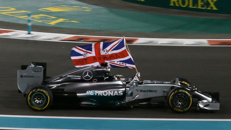 Race winner and World Champion Lewis Hamilton celebrates