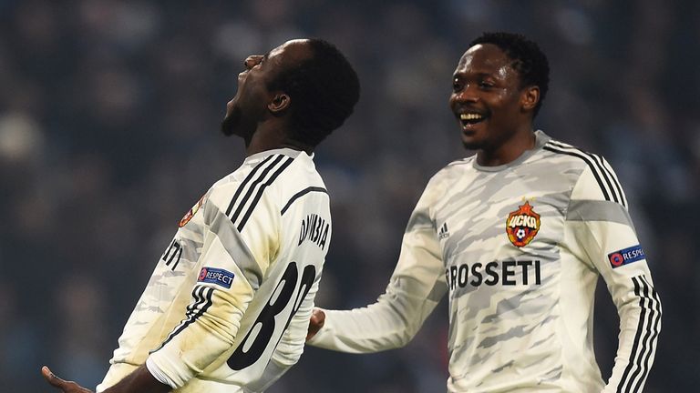 Seydou Doumbia of CSKA Moscow celebrates scoring his team's second goal with Ahmed Musa (R) during the UEFA Champions League clash at Manchester City