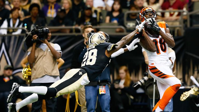 A.J. Green of the Cincinnati Bengals with a touchdown reception against  Keenan Lewis #28 of the New Orleans Saints