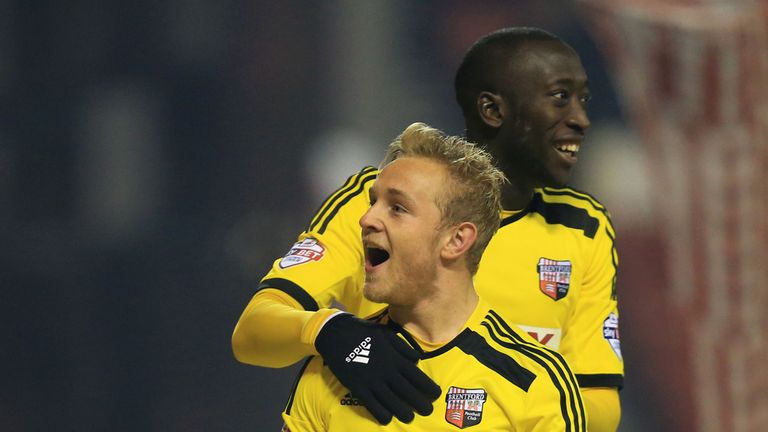 Brentford's Alex Pritchard celebrates scoring their third goal during the Sky Bet Championship match at the City Ground, Nottingham.