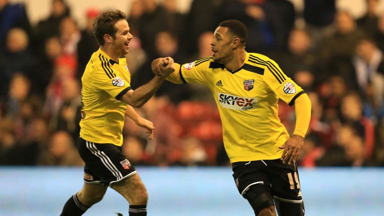 Brentford's Andre Gray celebrates scoring their second goal during the Sky Bet Championship match at the City Ground, Nottingham.