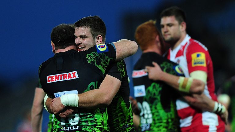Jerry Sexton of Exeter Chiefs embraces Greg Bateman of Exeter Chiefs at the final whistle during the LV= Cup match against Gloucester