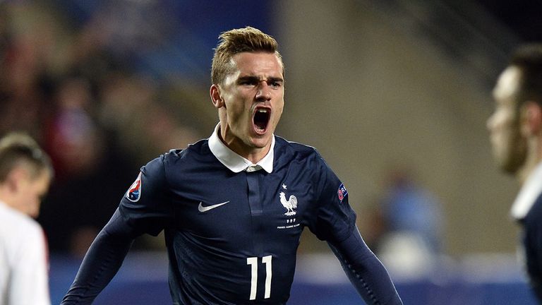 French forward Antoine Griezmann (C) celebrates after scoring during the friendly football match France vs Albania