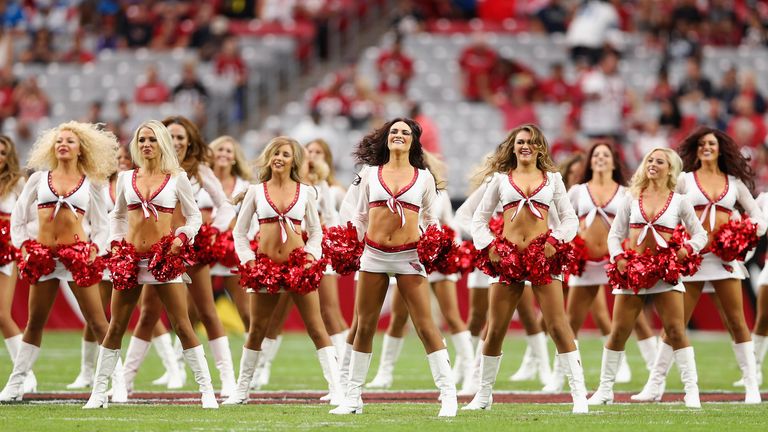 The Arizona Cardinals cheerleaders perform before the NFL game against the Detroit Lions