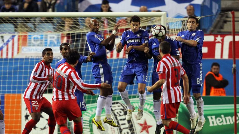 The Chelsea wall cannot stop Sergio Aguero of Atletico Madrid from scoring a free kick for Atletico Madrid