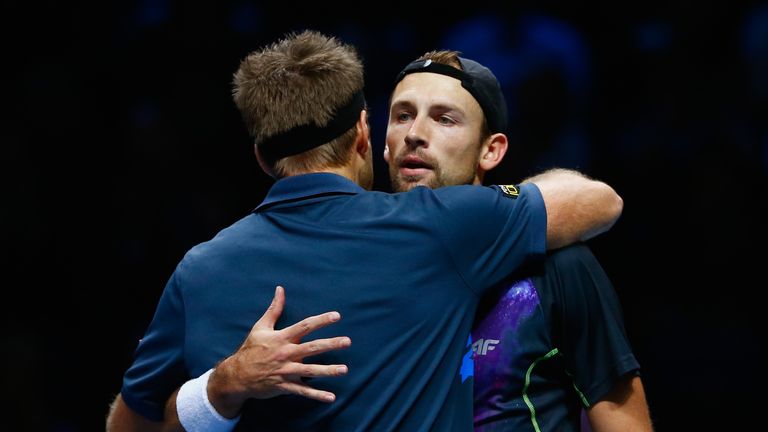 LONDON, ENGLAND - NOVEMBER 12:  Lukasz Kubot of Poland and Robert Lindstedt of Sweden celebrate match point in the round robin doubles match against Alexan