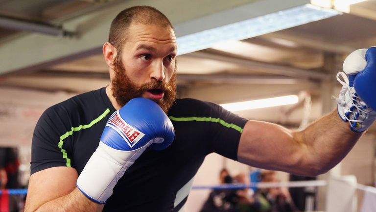 LONDON, ENGLAND - NOVEMBER 26:  Tyson Fury in action during a Media Work Out session at the Peacock Gym in Canning Town on November 26, 2014 in London, Eng