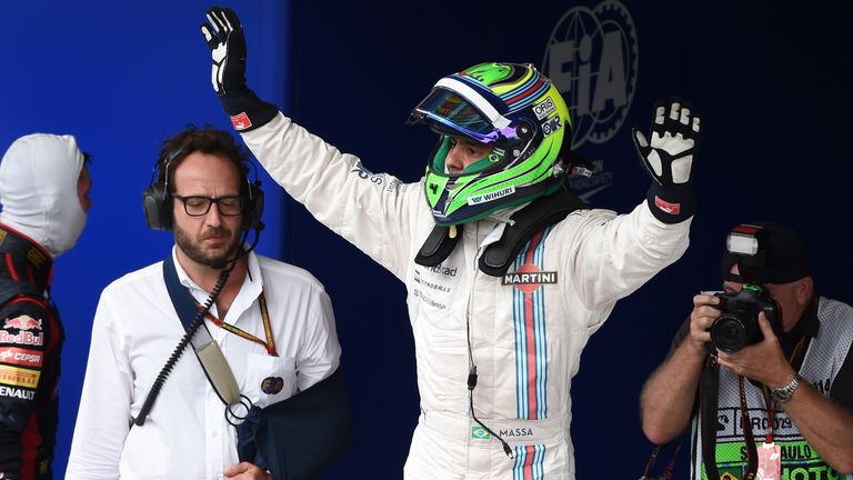 Third placed Felipe Massa celebrates in parc ferme