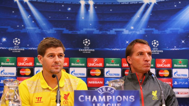 Brendan Rodgers the manager of Liverpool and Steven Gerrard face the media during a press conference at Anfield
