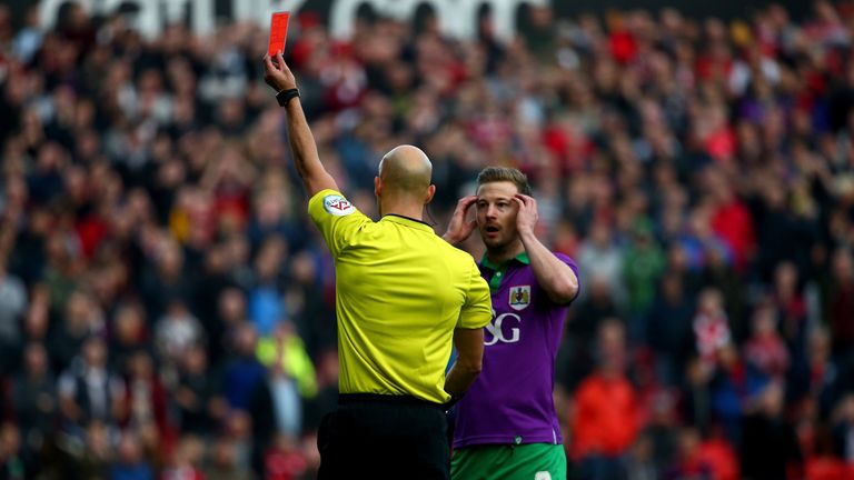 Wade Elliott of Bristol City reacts as is sent off by referee Darren Drysdale