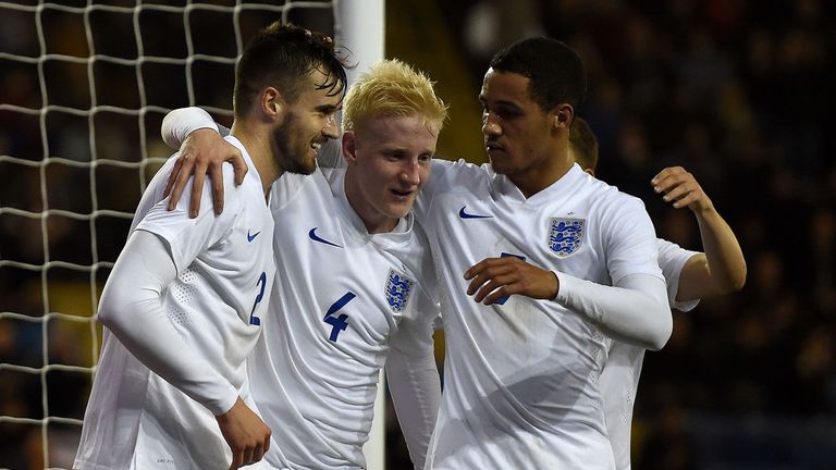 England U21's Carl Jenkinson (left) celebrates scoring his teams second goal against Portugal U21 with Will Hughes (centre) and Tom Ince (right)
