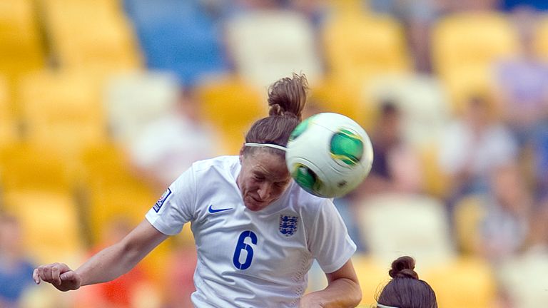 Casey Stoney of England Women (L) fights for the ball with Tetyana Romanenko of Ukraine Women during the FIFA Women's World Cup Qualifier