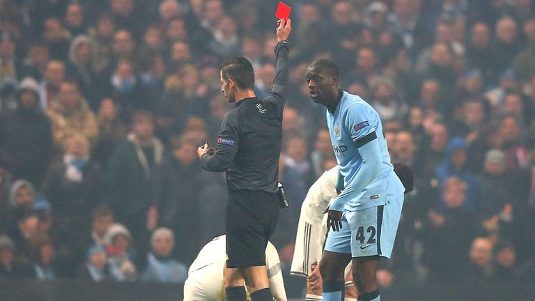 Yaya Toure of Manchester City is shown a red card by Referee Tasos Sidriopoulos during the UEFA Champions League clash with CSKA Moscow