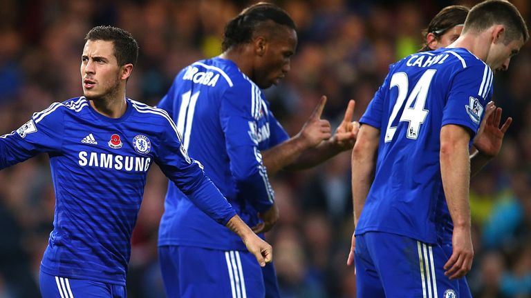 Eden Hazard celebrates his winning goal from the penalty spot against Queens Park Rangers at Stamford Bridge on Saturday