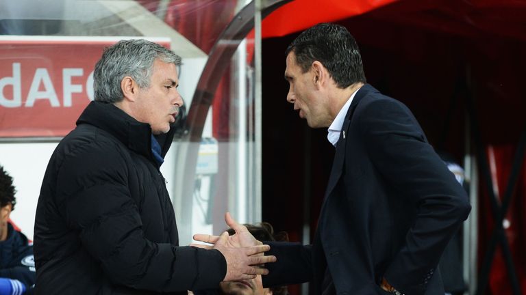 Jose Mourinho manager of Chelsea and Gustavo Poyet manager of Sunderland shake hands prior to the Barclays Premier League at the Stadium of Light