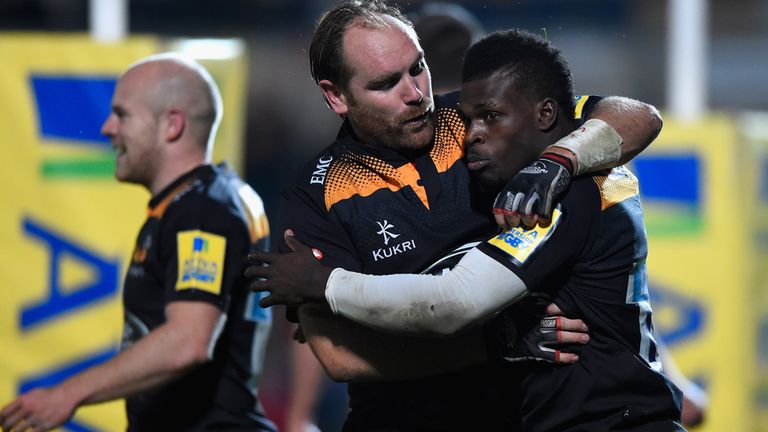 Christian Wade of Wasps is congratulated by team mate Andy Goode after scoring a try