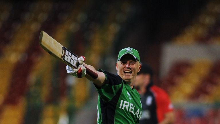 Ireland cricketer Kevin O'Brien celebrates his century (100 runs) during the ICC Cricket World Cup 2011 match between England and Ireland at The M. Chinnas