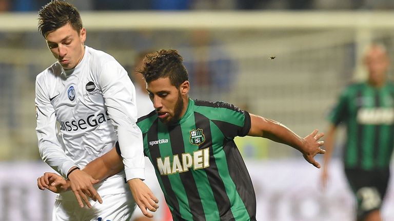 REGGIO NELL'EMILIA, ITALY - NOVEMBER 08: Daniele Baselli of Atalanta and Saphir Taider of Sassuolo in action during the Serie A match between US Sassuolo C
