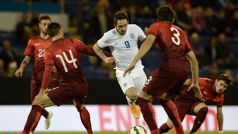 Danny Ings of England U21 takes on the Portugal defence