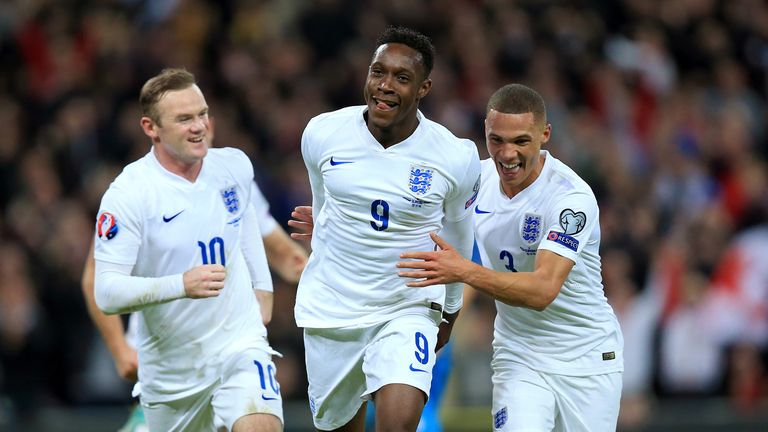 England's Danny Welbeck (centre) celebrates with team-mates Kieran Gibbs (right) and Wayne Rooney v Slovenia, European Qualifiers