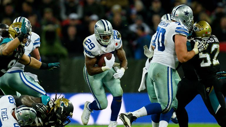 DeMarco Murray of the Dallas Cowboys bursts through a hole during the game against the Jacksonville Jaguars at Wembley Stadium