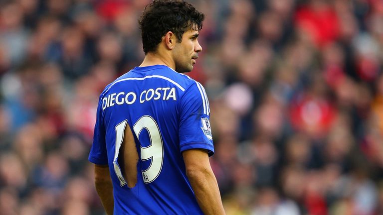 Diego Costa's shirt is ripped during the game against Liverpool