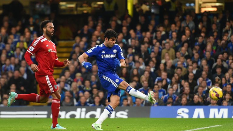 Diego Costa of Chelsea scores the opening goal under pressure from Joleon Lescott
