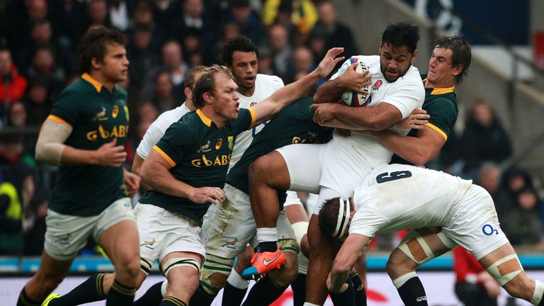 England's Billy Vunipola is tackled during the QBE International at Twickenham, London.
