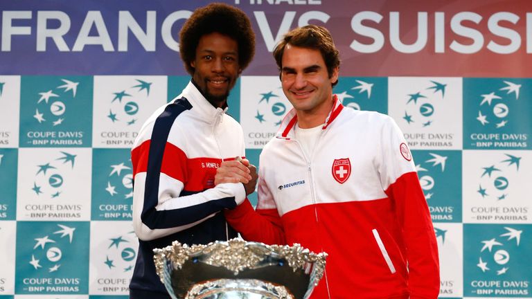 Gael Monfils and Roger Federer at the draw for the Davis Cup Final 2014