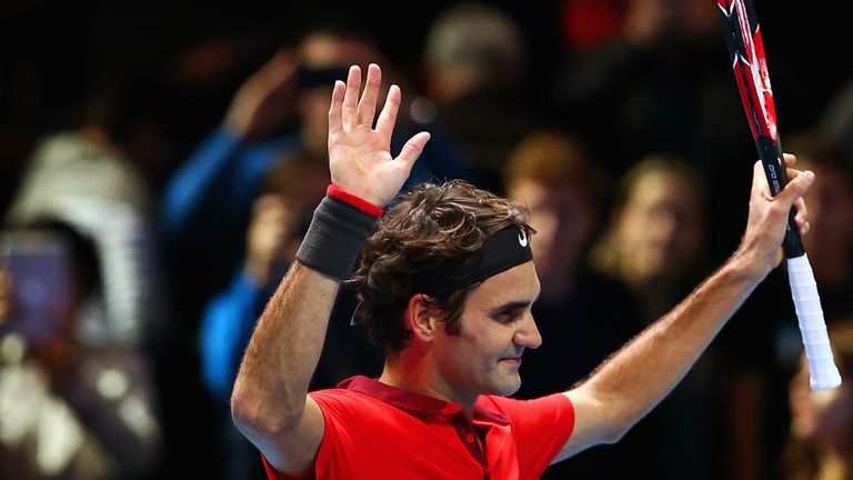 LONDON, ENGLAND - NOVEMBER 15:  Roger Federer of Switzerland celebrates victory in the singles semi-final match against Stan Wawrinka of Switzerland on day