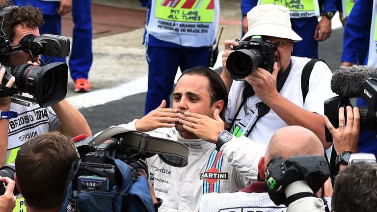 Felipe Massa blows a kiss to his fans