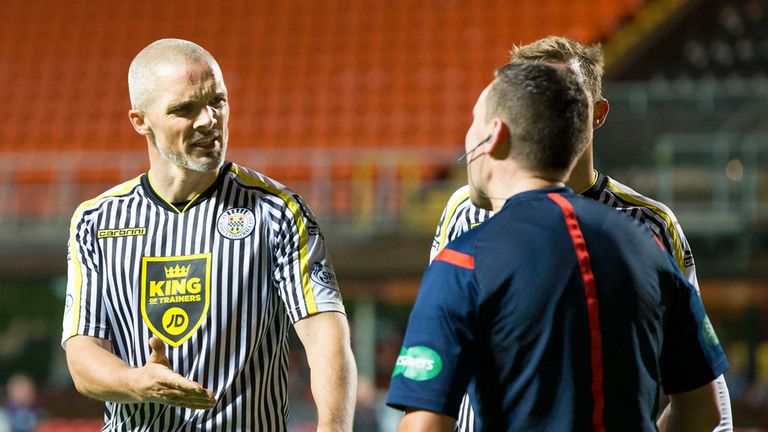 .St Mirren midfielder Jim Goodwin has words with Referee Andrew Dallas