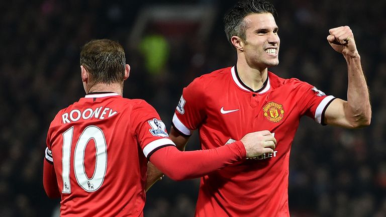 Manchester United's Robin Van Persie (right) celebrates scoring his side third goal of the game during the Barclays Premier League match at Old Trafford,