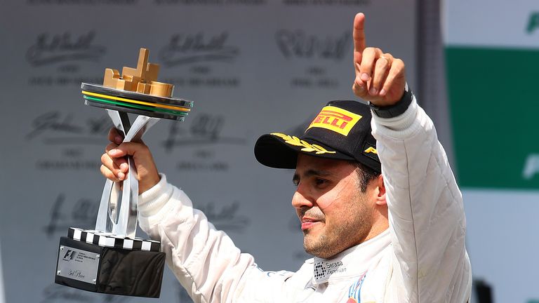 Felipe Massa celebrates on the podium