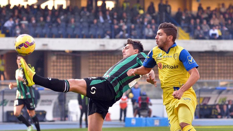 Francesco Acerbi stretches for the ball