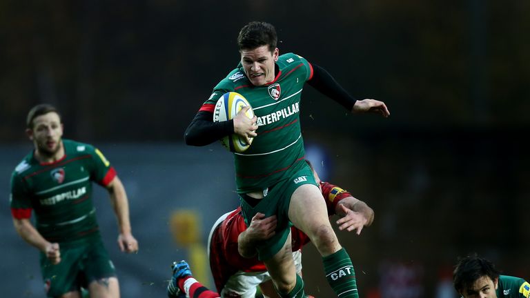 Freddie Burns of Leicester Tigers is tackled by Lachlan McCaffrey of London Welsh during the Aviva Premiership match