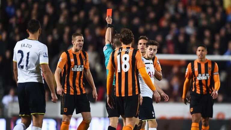 HULL, ENGLAND - NOVEMBER 23:  Gaston Ramirez of Hull City is shown the red card by referee Craig Pawson during the Barclays Premier League match between Hu