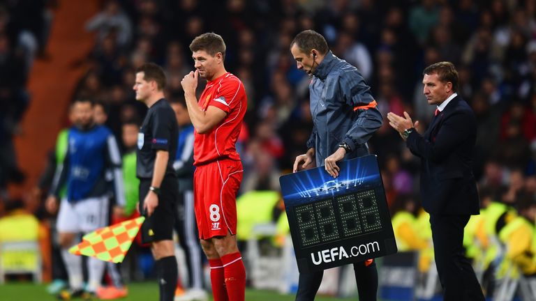 MADRID, SPAIN - NOVEMBER 04:  Brendan Rodgers, manager of Liverpool looks on as Steven Gerrard of Liverpool prepares to come on during the UEFA Champions L