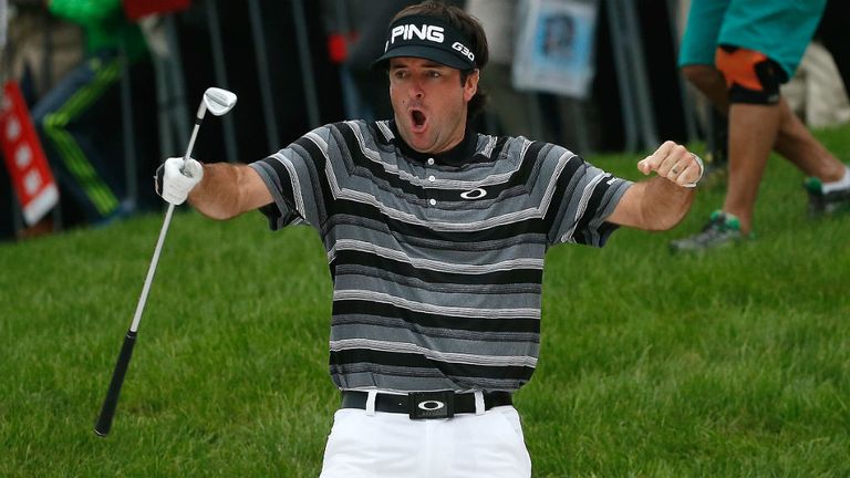 Bubba Watson celebrates after holing a bunker shot on the 18th hole to make an eagle and reach a playoff
