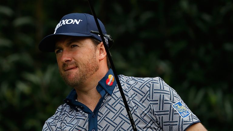 SHANGHAI, CHINA - NOVEMBER 06:  Graeme McDowell of Northern Ireland watches his tee shot oin the fifth hole during the first round of the WGC - HSBC Champi