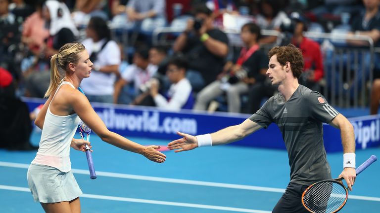 Andy Murray and Maria Sharapova of the Manila Mavericks celebrate a point against Kristina Mladenovic and Nenad Zimonjic of the UAE Royals 