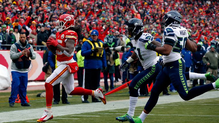 Jamaal Charles of the Kansas City Chiefs scores a touchdown against  Seattle Seahawks