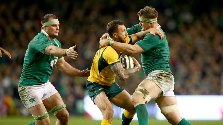 DUBLIN, IRELAND - NOVEMBER 22:  Kurtley Beale of Australia is tackled by Jamie Heaslip of Ireland during the international friendly match between Ireland a