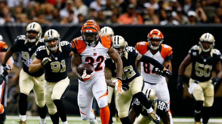 Jeremy Hill of the Cincinnati Bengals runs the ball down the field against the New Orleans Saints