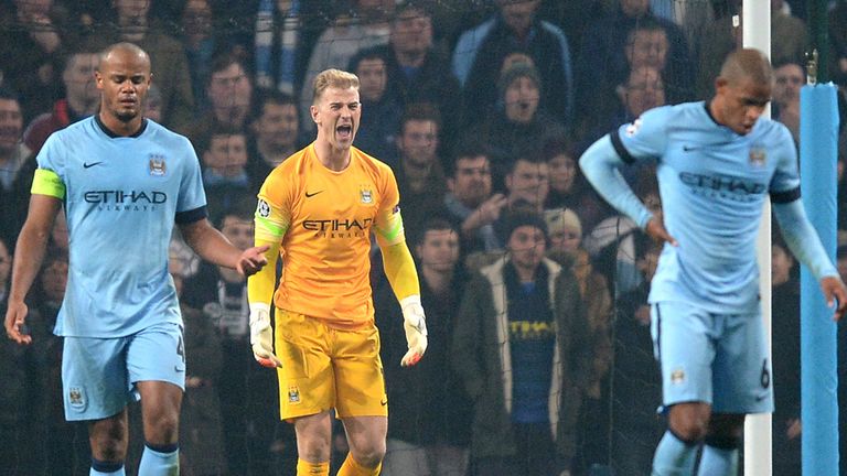 Manchester City goalkeeper Joe Hart (centre) shouts at his defence after conceding the second goal of the match during the  Champions League Group E match